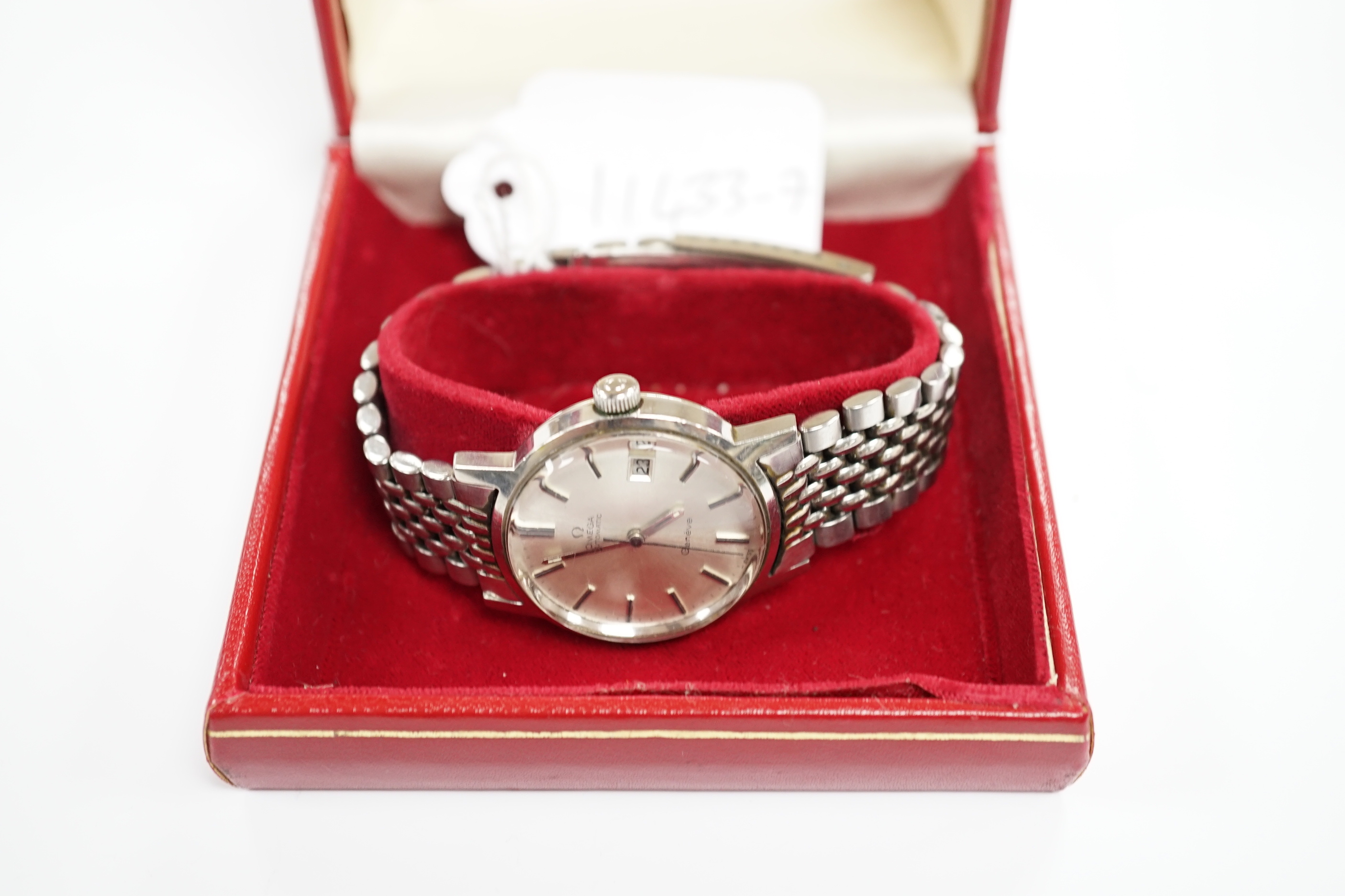 A gentleman's early 1970's stainless steel Omega automatic wrist watch, with date aperture, on a stainless steel Omega bracelet, with Omega box, no papers.